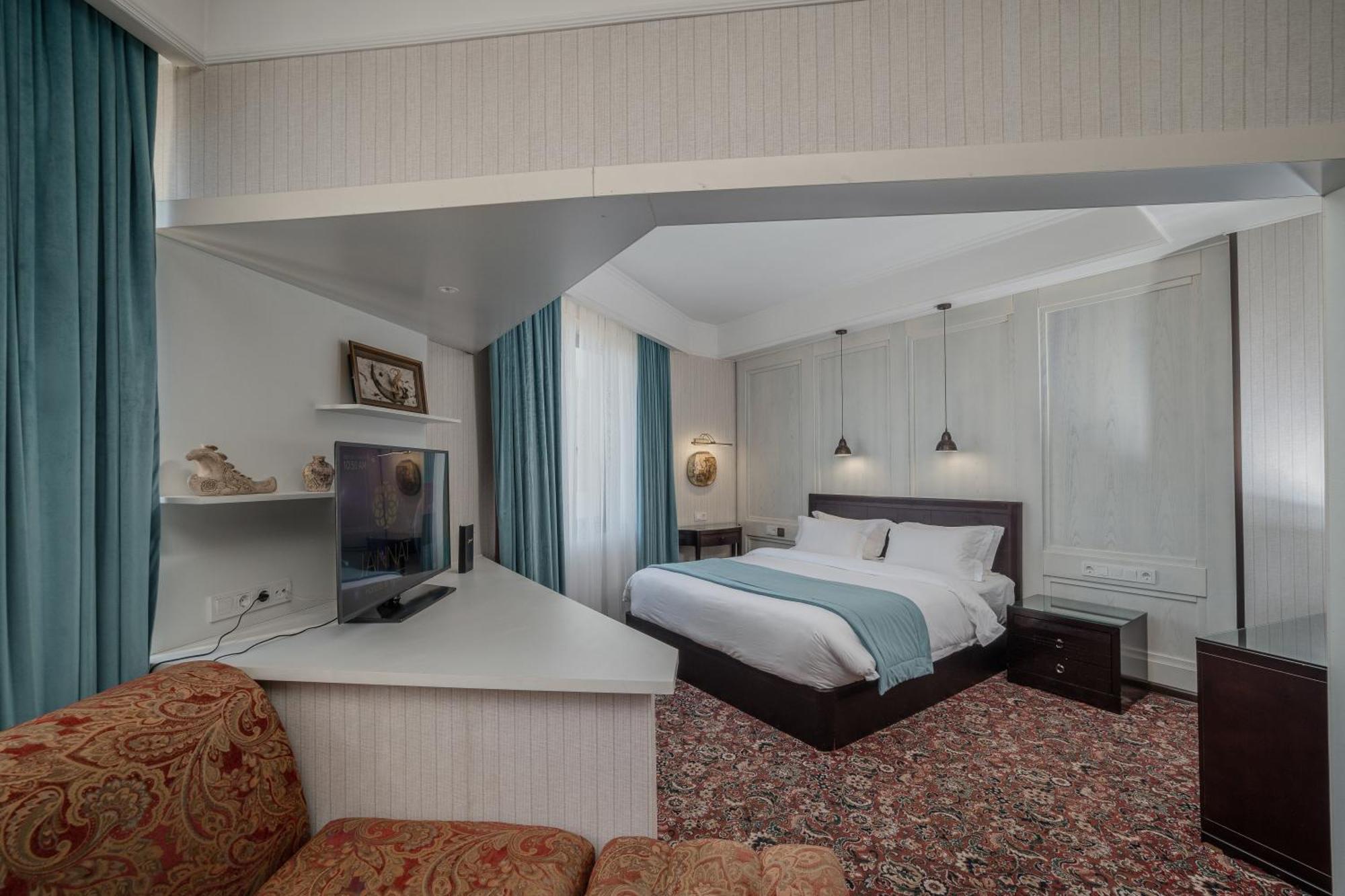 Jannat Regency Hotel Biskek Szoba fotó