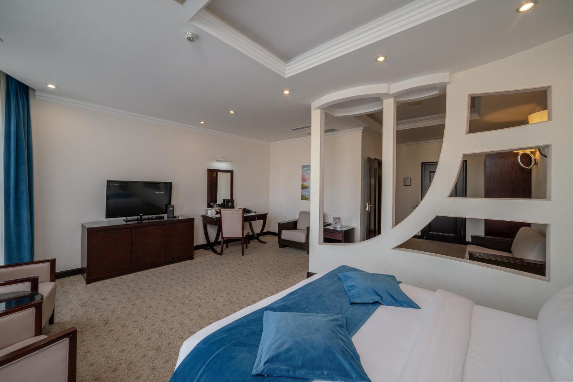 Jannat Regency Hotel Biskek Szoba fotó